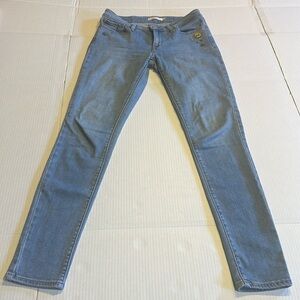 Levi’s 711 skinny jeans embellished vintage soft blue wash stars eyes zipper fly